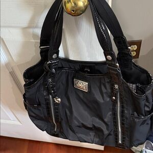 Brighton Shoulder Bag with Silver Accents  with zipper compartments.Authentic
